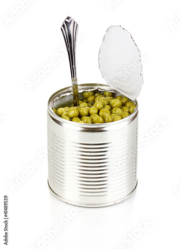 Open tin can of peas with spoon isolated on white