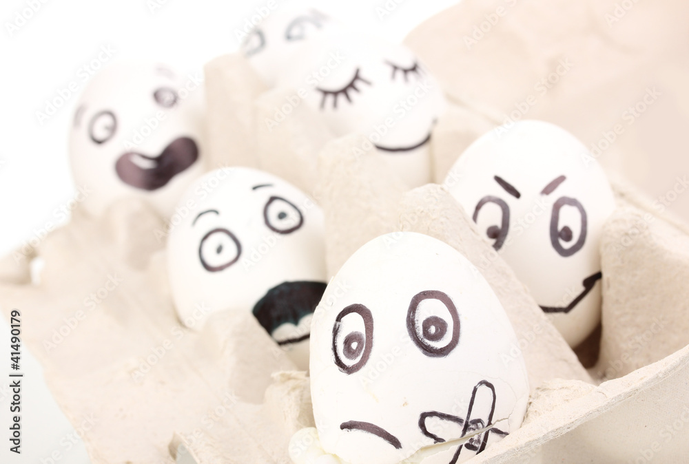 Obraz premium White eggs with funny faces
