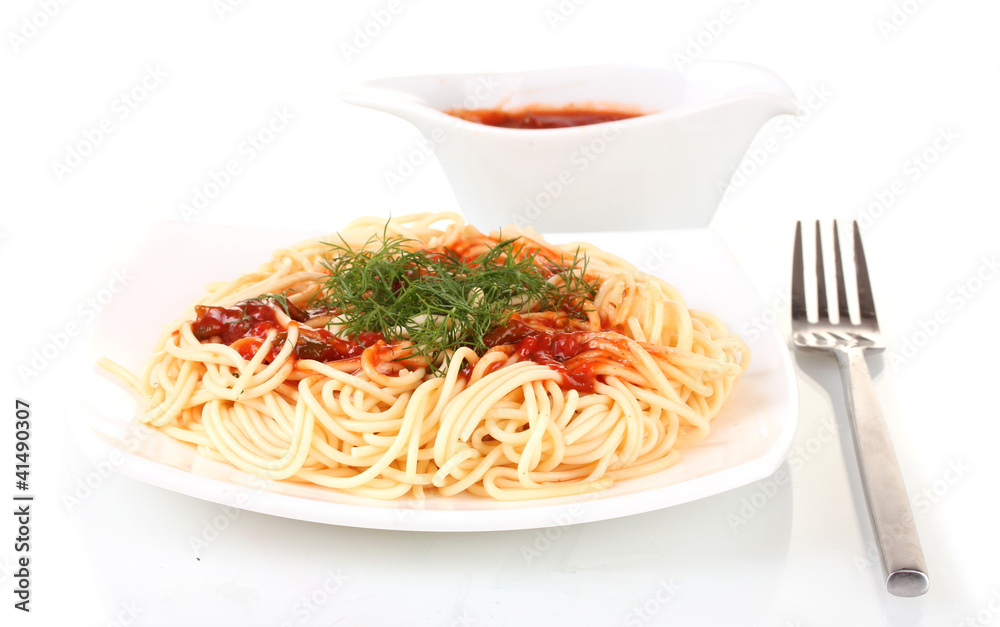 Italian spagetti cooked in a white plate with tomato sauce Italian spagetti cooked in a white plate with tomato sauce