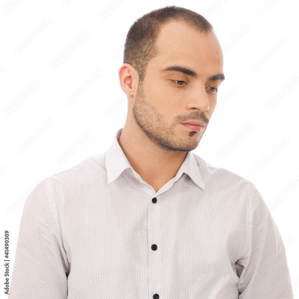 Portrait of young man looking down isolated on white background Portrait of young man looking down isolated on white background