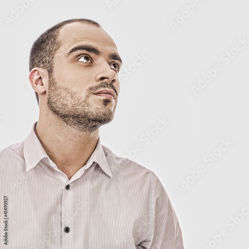 Fashion portrait of adult handsome business man looking away