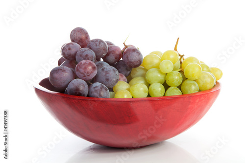 Red bowl with grapes