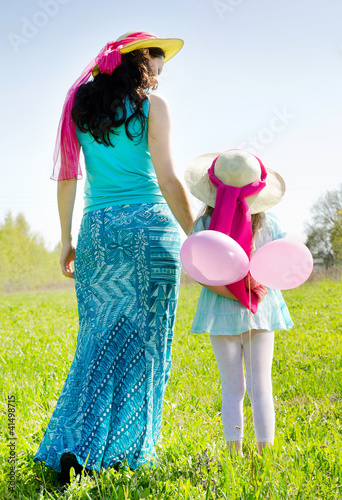 Mother and daughter outdoors in spring