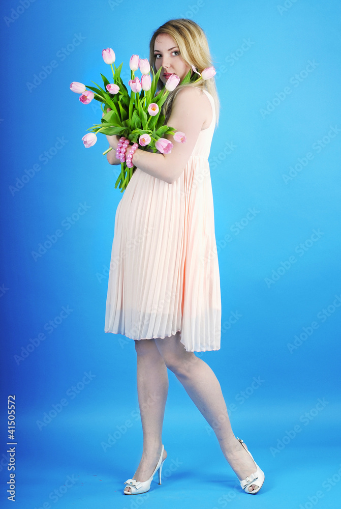 Beautiful pregnant girl with rose tulip