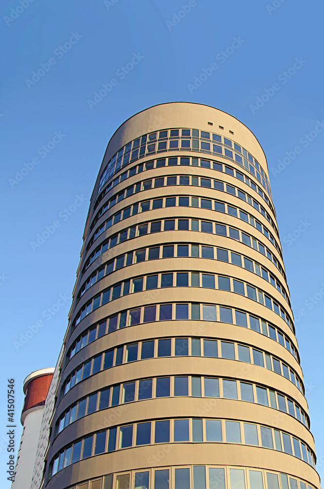 modern office building over sky
