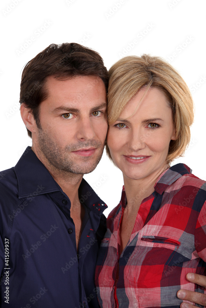 Couple stood with faces touching Couple stood with faces touching