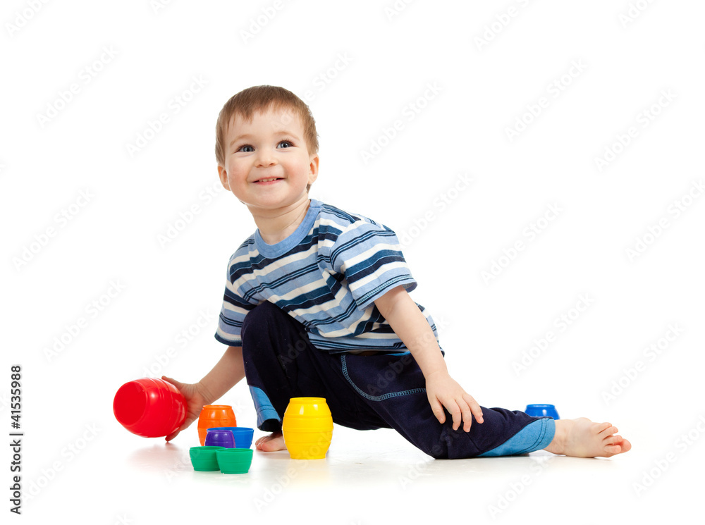 kid playing on floor on white background kid playing on floor on white background