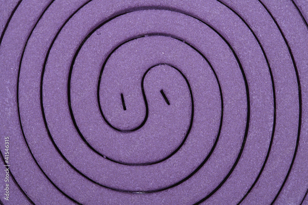 Close up Purple mosquito spiral coil.