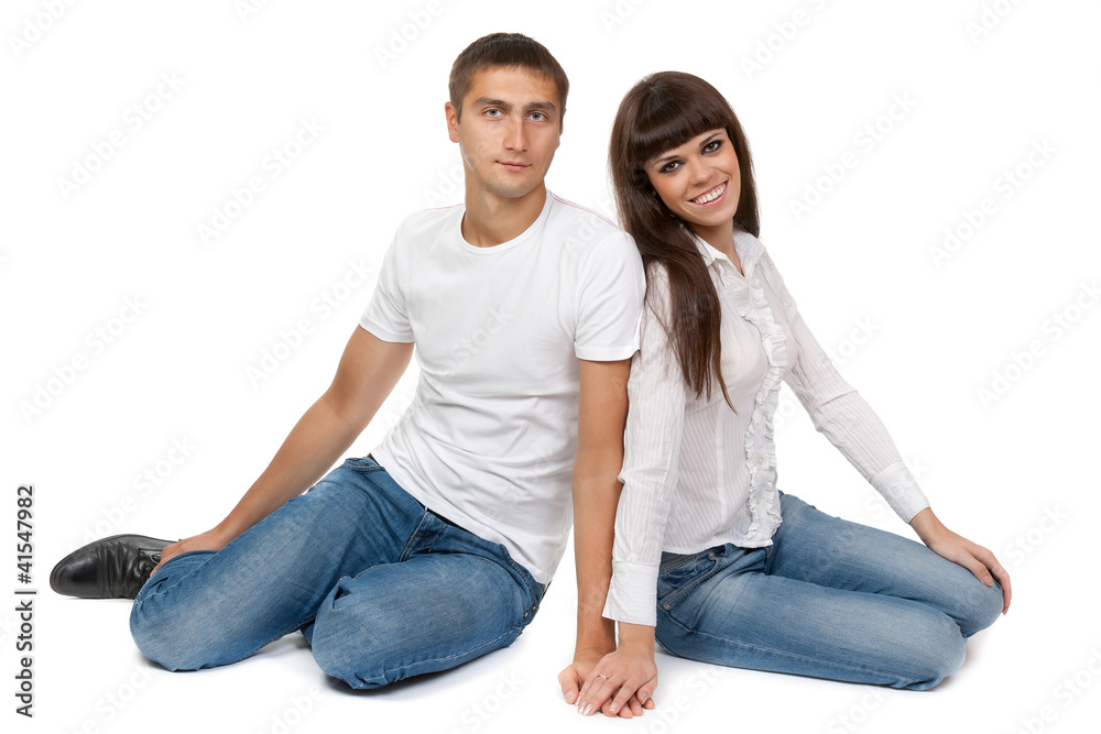 Romantic young couple sitting on floor Romantic young couple sitting on floor