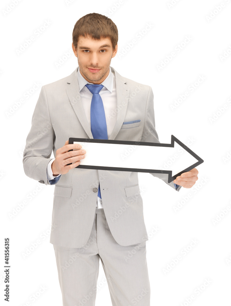 businessman with direction arrow sign