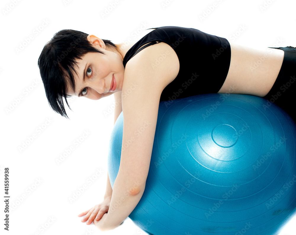 Fototapeta premium Fitness exercise woman resting on pilates ball