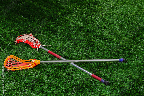 Lacrosse sticks on the ground