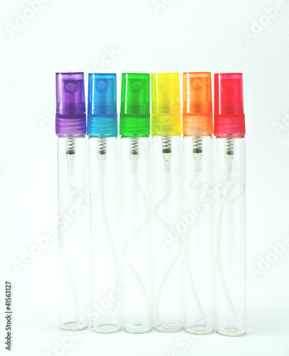 colorful spray bottle on white background