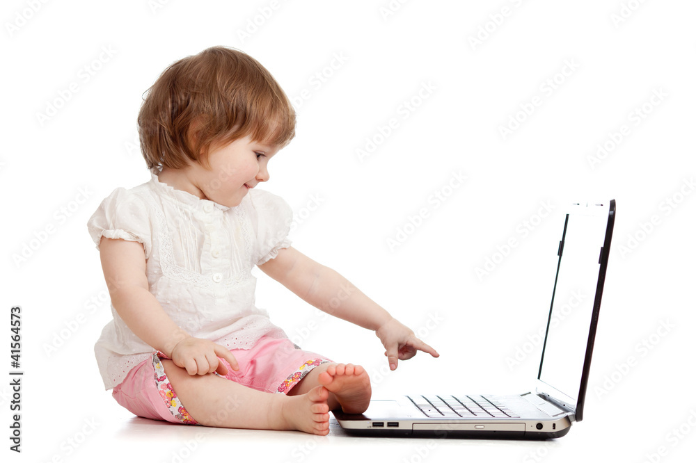 kid pointing by finger to notebook screen on white background kid pointing by finger to notebook screen on white background
