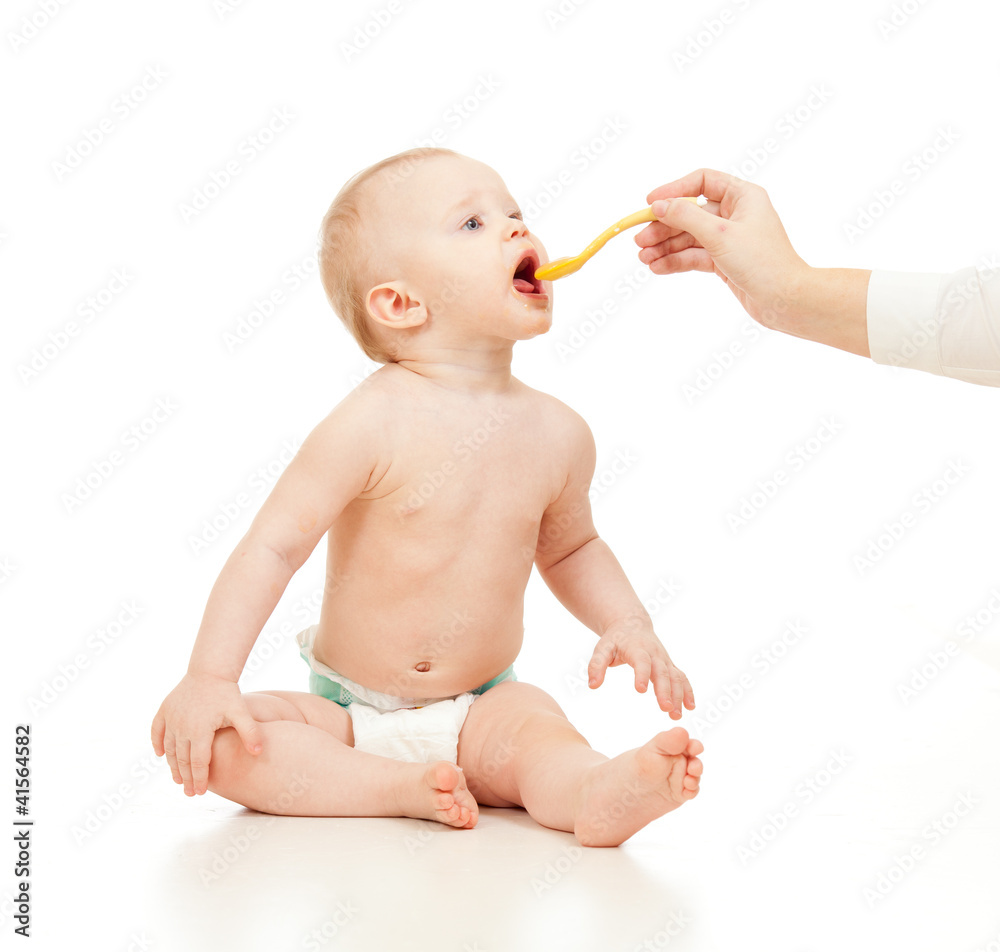 baby in diaper feeding on white background baby in diaper feeding on white background