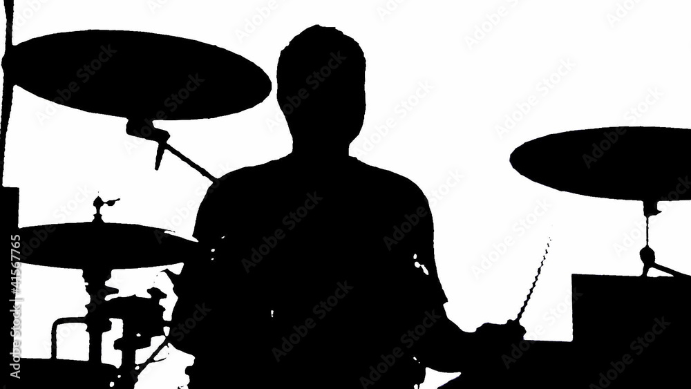 Silhouette of musician playing drums