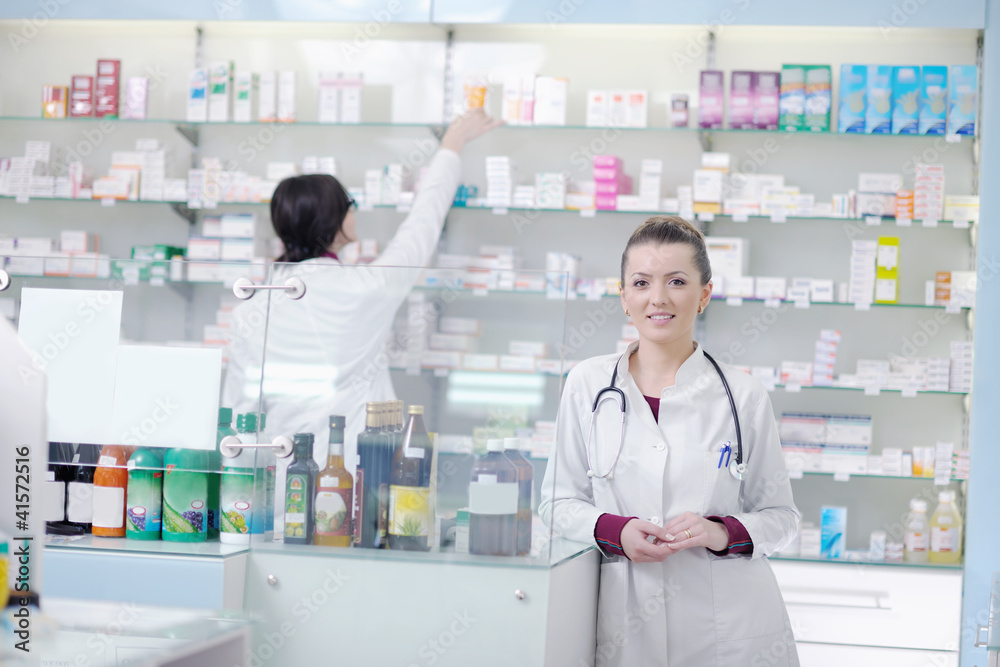 team of pharmacist chemist woman  in pharmacy drugstore