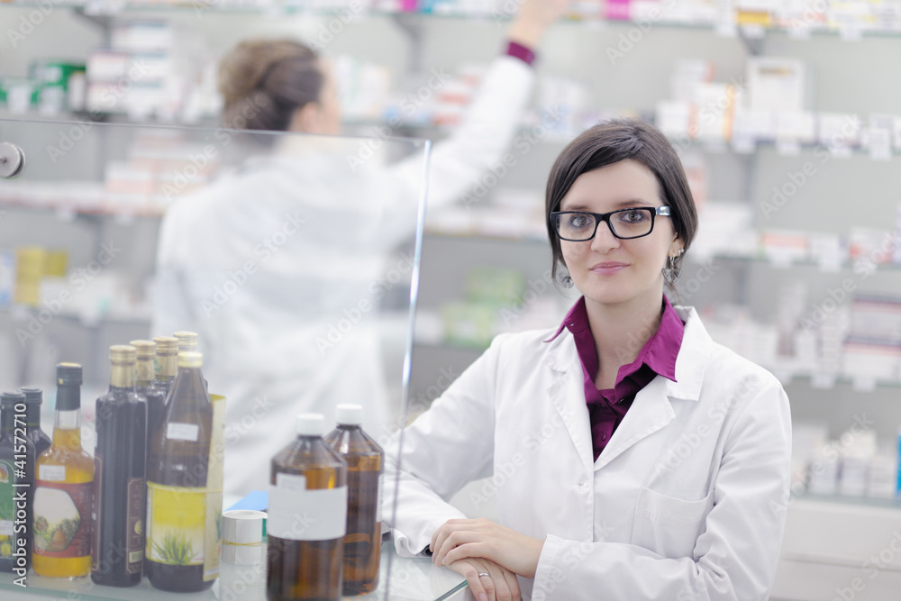 team of pharmacist chemist woman in pharmacy drugstore team of pharmacist chemist woman in pharmacy drugstore