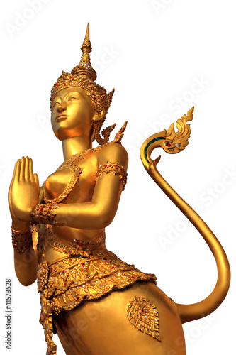 A Golden Kinnari statue at the Wat Phra Kaew photo