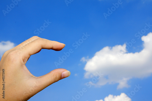 hand and blue sky