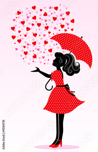 silhouette of a girl under a rain of hearts