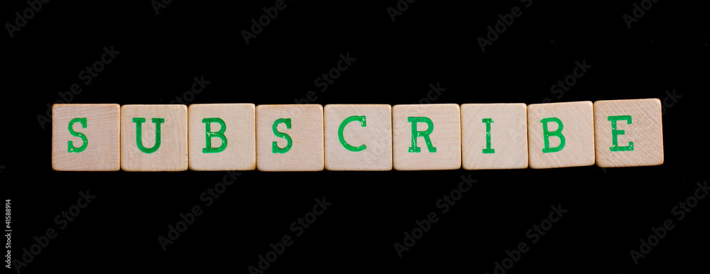 Green letters on old wooden blocks (subscribe) Green letters on old wooden blocks (subscribe)