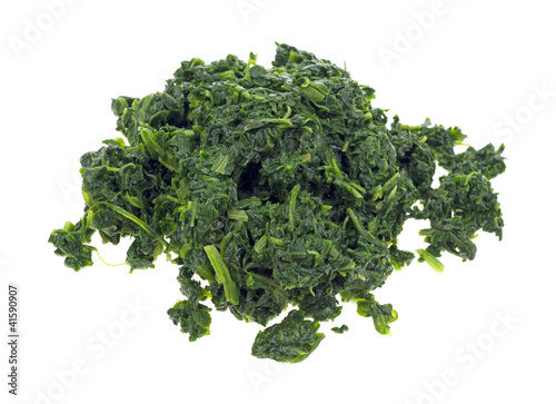 Chopped spinach on white background