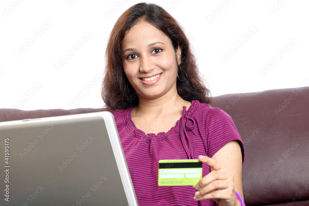 Fototapeta premium Indian woman shopping online from home