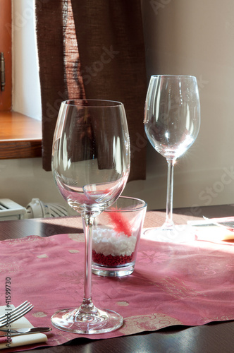 Wine glasses on the table with candle