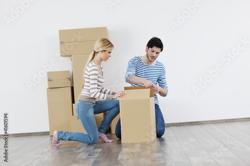 Young couple moving in new house © .shock