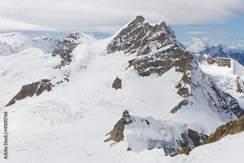 Mountain Jungfrau and mountain station Sphinx