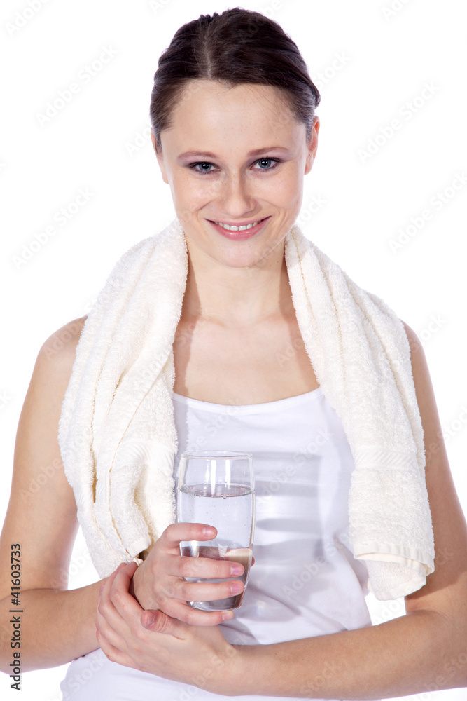 Sportliche Frau mit Wasser lächelt Porträt Sportliche Frau mit Wasser lächelt Porträt
