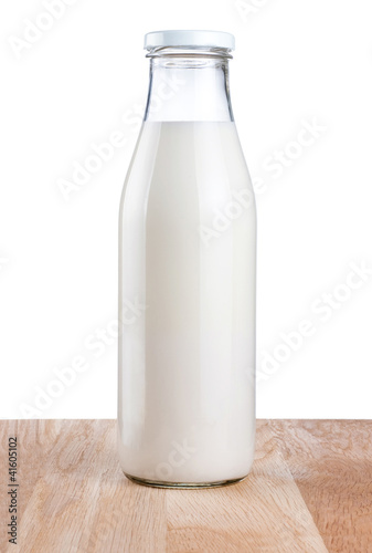 Bottle of fresh milk is wooden table Isolated on white backgroun