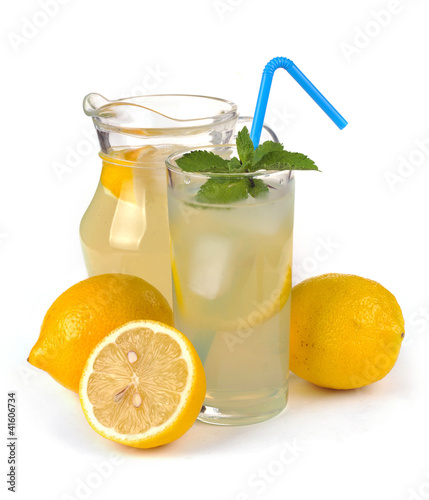lemon juice in a jug and fruit