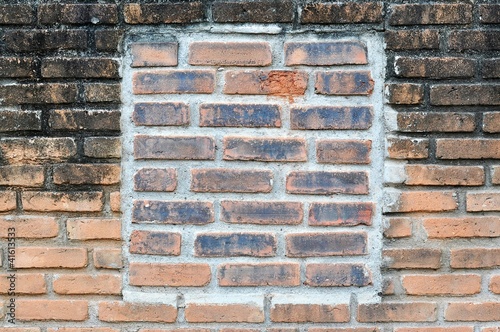 Brick frame on the brick wall