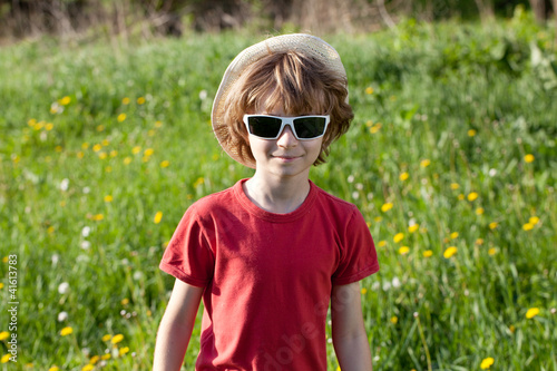 Shaggy boy in the hat