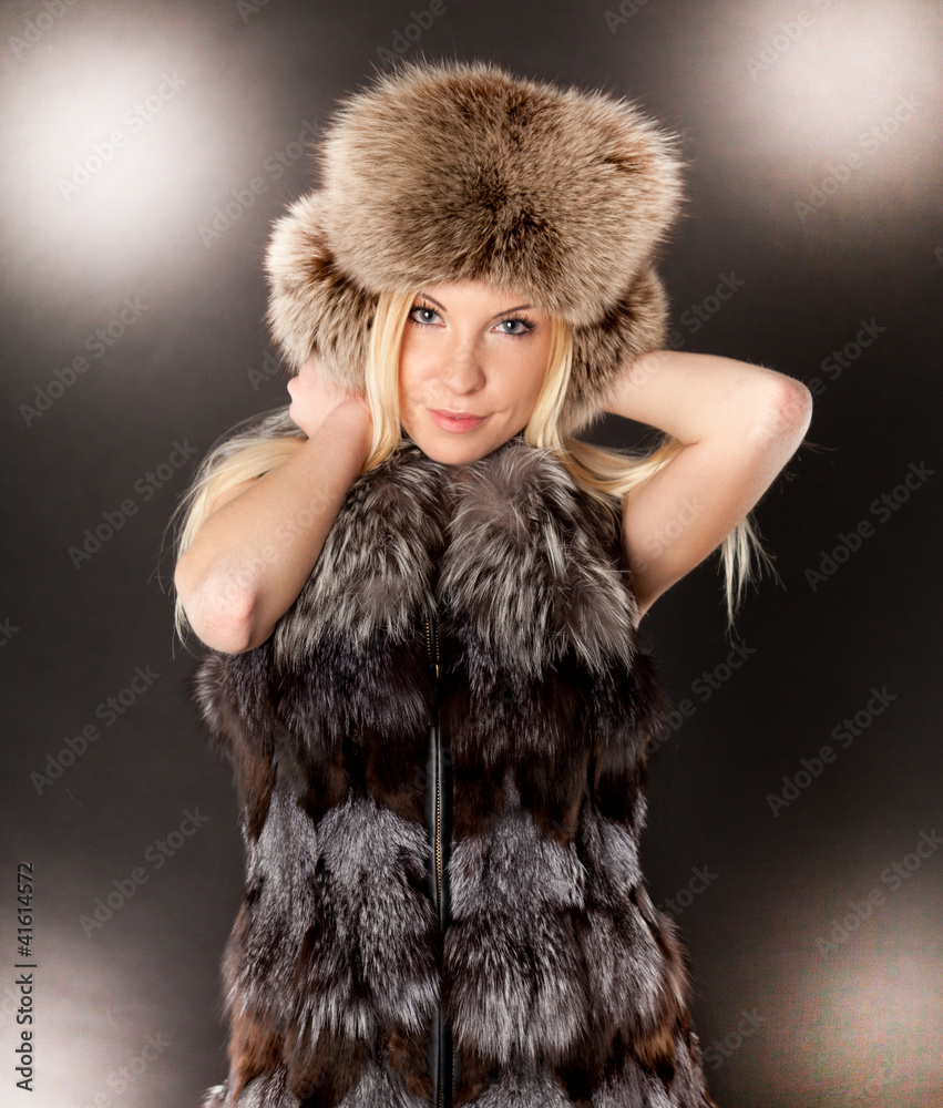 portrait of a beautiful blond woman wearing fur coat and hat portrait of a beautiful blond woman wearing fur coat and hat
