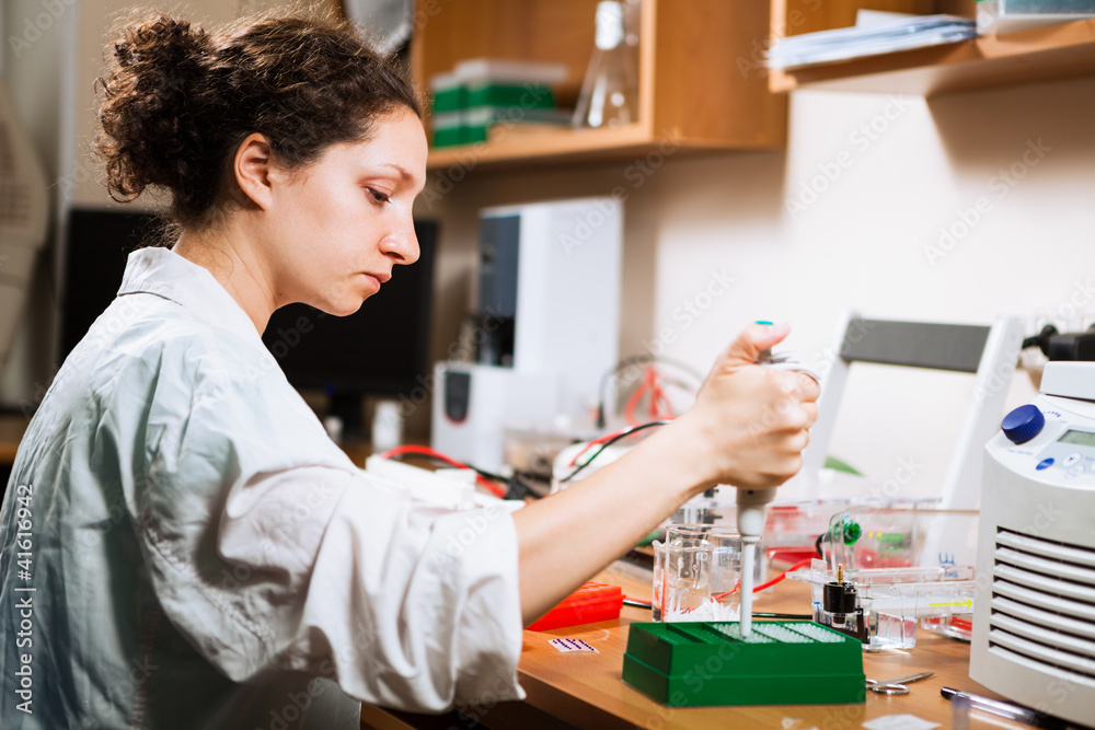 Researcher works at lab Researcher works at lab