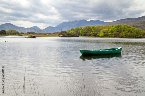 Fototapeta Naklejka Na Ścianę i Meble -  Boat on the Killarney lake, Co. Kerry in Ireland