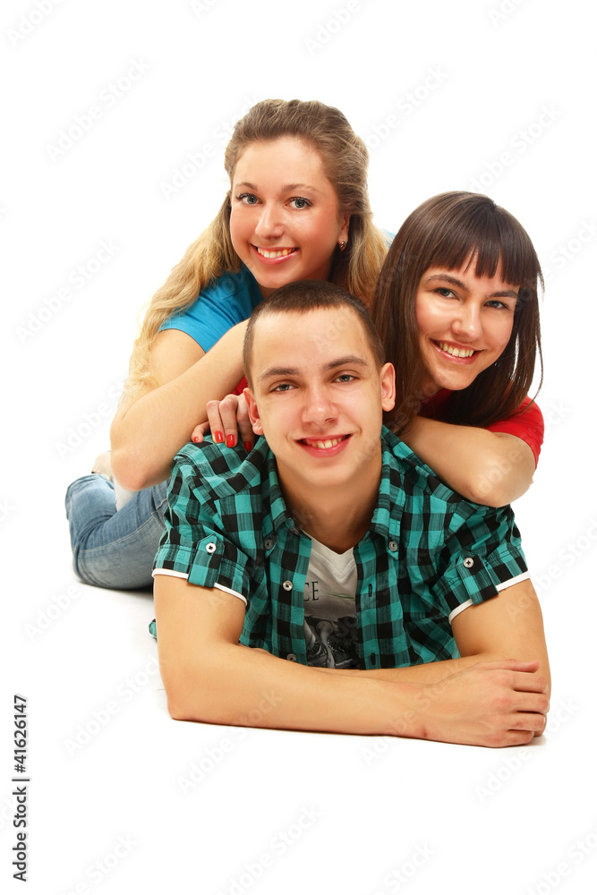 Happy college friends lying on the floor Happy college friends lying on the floor