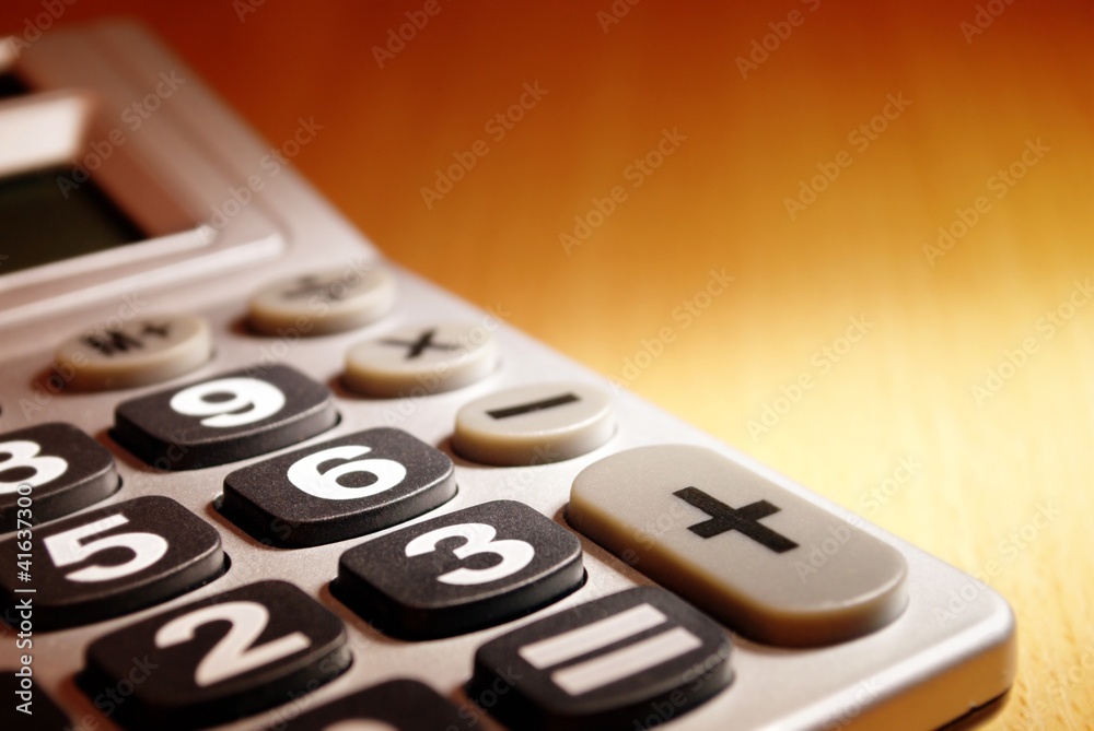 calculator on a desk and a place for your text calculator on a desk and a place for your text