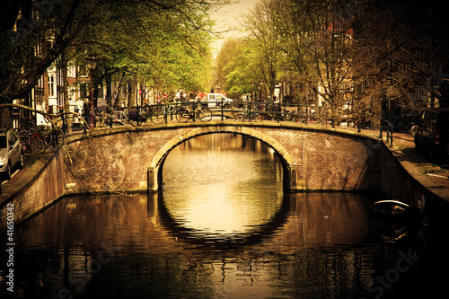 Amsterdam. Romantic bridge over canal. #41650342