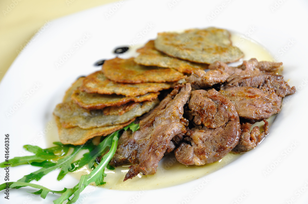 Lamb medallions with homemade potato pancakes, Czech cuisine