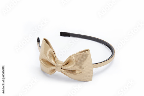 Headband with bow on white background.