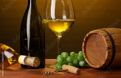 In wine cellar. Composition of wine bottle and runlet