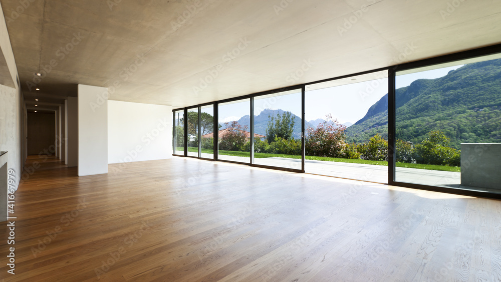 modern concrete house with hardwood floor, wide open space - obrazy, fototapety, plakaty 