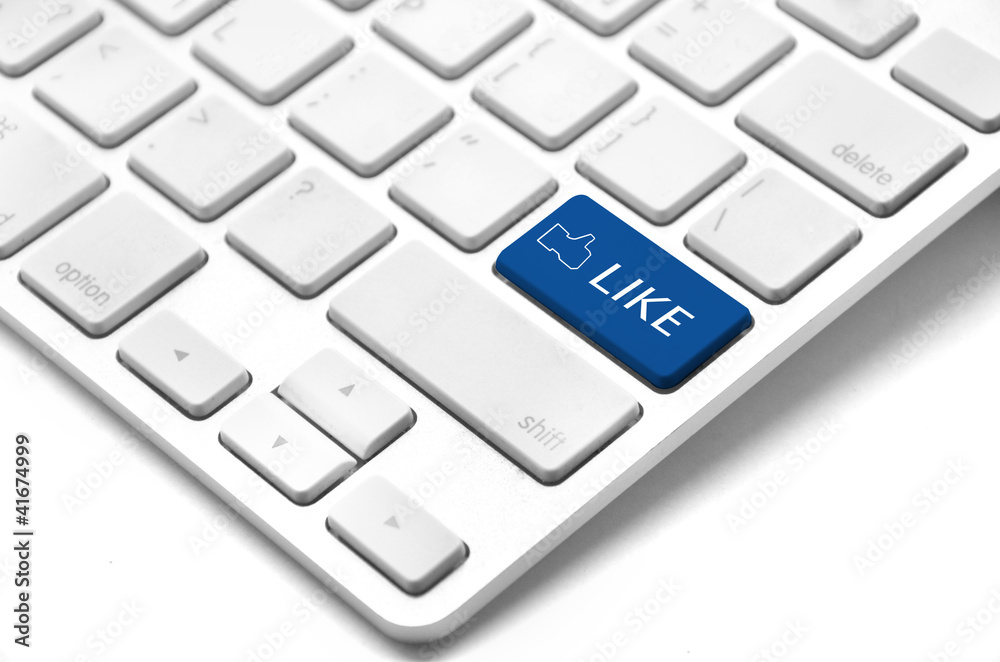 A keyboard with a blue key with the Thumb's Up like icon, illust A keyboard with a blue key with the Thumb's Up like icon, illust