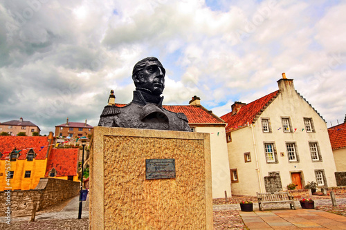 Streets of Culross, Fife, Scotland.  A bust of Thomas Cochrane. photo