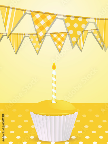 bunting and yellow birthday cupcake