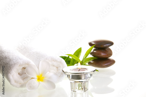 Spa concept with red zen stones and white flower